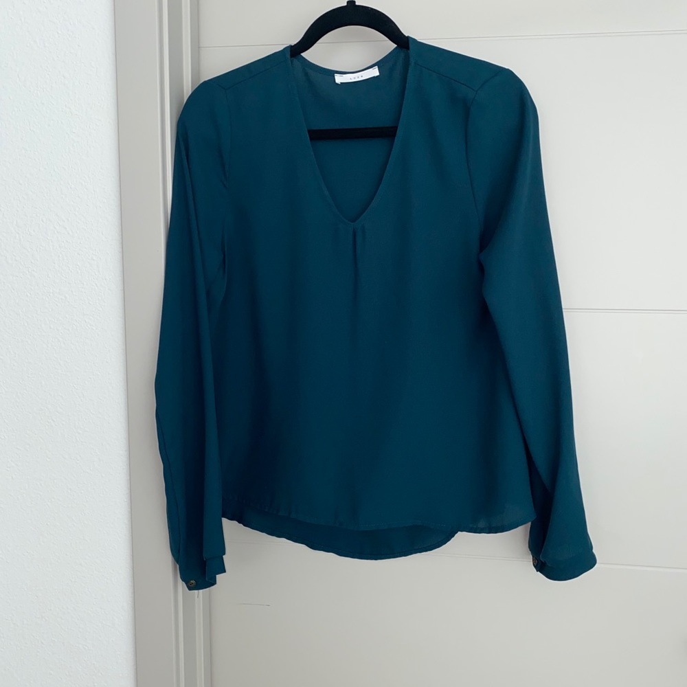 Green V-neck blouse